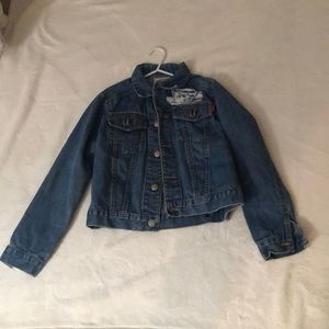 Kids jean jacket with design.